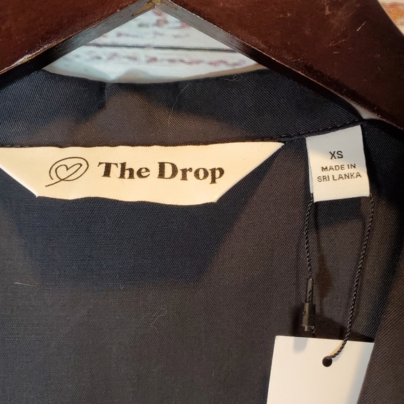 Crossed dress, short sleeves and front pockets ●●only available in black… - Picture 7 of 10